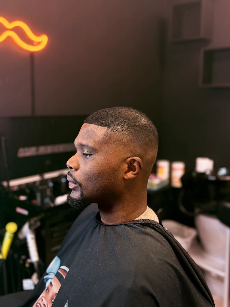 Skin taper haircut at FadezByBoda